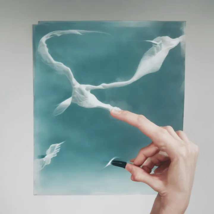 A hand holds up a teal-blue panel against a white wall. Painted on it, pale vaporous bird-forms stream across the surface; the pointing index finger of the same hand enters the picture plane and appears to become one of them. Trompe-l'oeil, quiet, about a hand entering its own image.